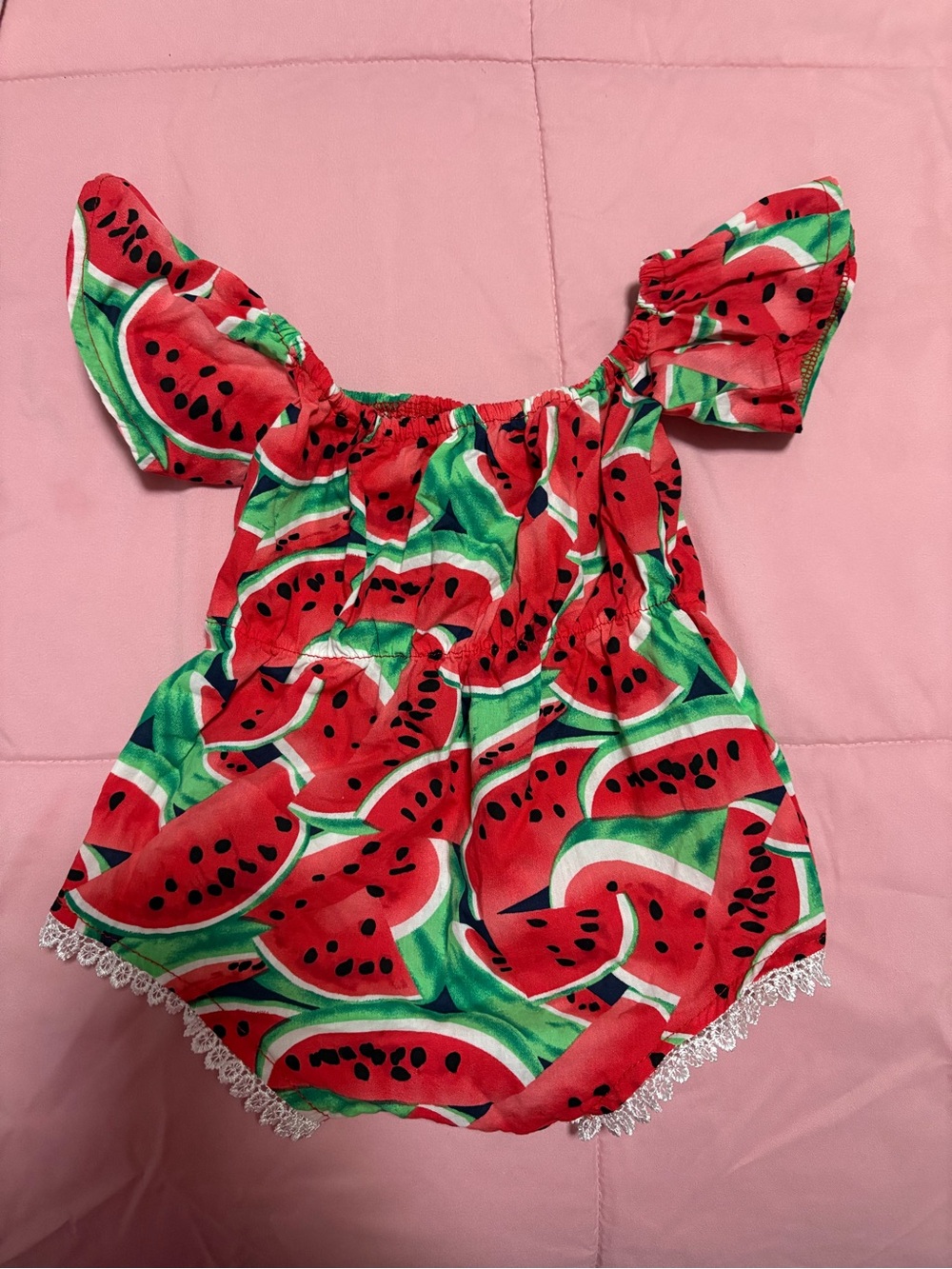 Watermelon print baby romper with ruffled sleeves and lace trim